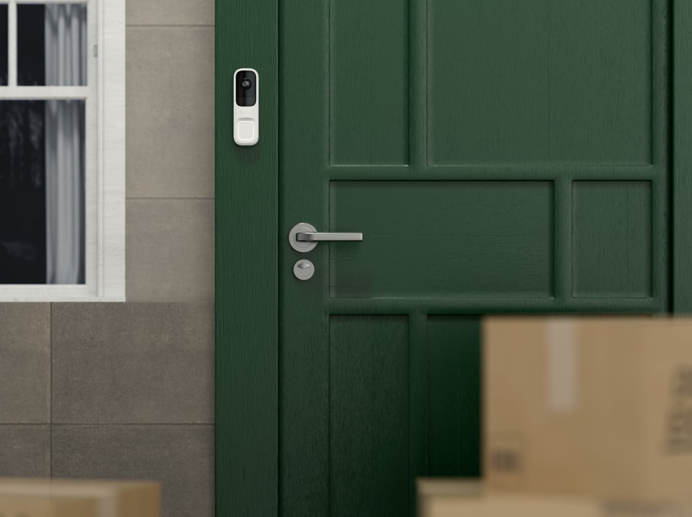 Sonnette vidéo Ajax DoorBell installée près d’une porte d’entrée